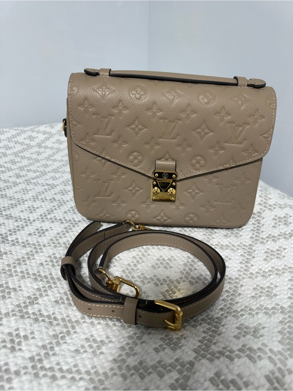 LVBeige Monogram Embossed Crossbody Bag with Gold Hardware